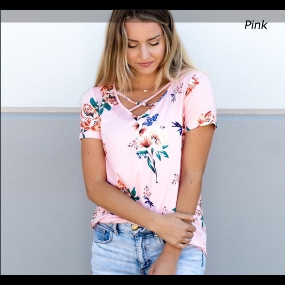 Woman’s Blouse with criss cross neckline.